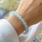 aquamarine bracelet lifestyle shot with soft blue tones