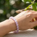 model wearing lepidolite bracelet for calm and emotional balance