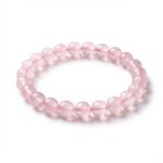 rose quartz bracelet product photo on white background