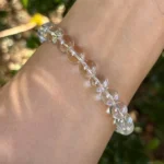 clear quartz bracelet lifestyle shot showing natural light reflection