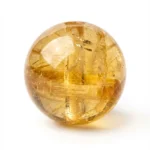 close-up of citrine beads symbolizing solar energy