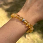 close shot of model wearing citrine bracelet