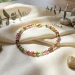 aurora tourmaline bracelet on soft silk background