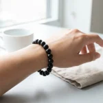 black obsidian bracelet lifestyle photo in soft natural lighting