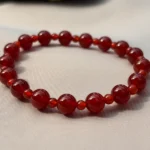 Carnelian Round Beads Bracelet on soft background