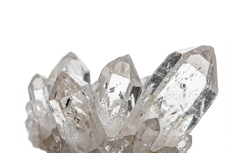 Raw Clear Quartz cluster with natural transparent crystal points.