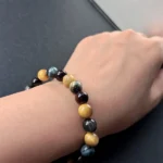 Model wearing Tigers Eye Trio Bracelet