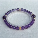 Quiet Mind Amethyst Bracelet with soft background