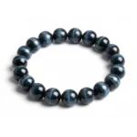 blue Tigers Eye bracelet on white background