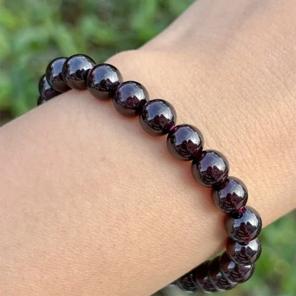 close shot of model wearing Almandine Garnet Bracelet