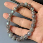 model holding Labradorite-Bead-Bracelet front view