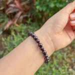 model wearing Almandine Garnet Bracelet back view