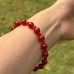 model wearing Carnelian round beads Bracelet side view