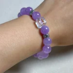 model wearing Gentle Calm Bracelet with clear quartz close shoot