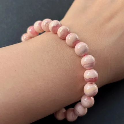model wearing Natural Rhodochrosite Bracelet