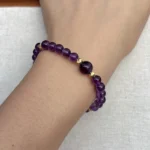 model wearing Quiet Mind Amethyst Bracelet front view