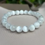 Soft Glow Cat’s Eye Bracelet on grey background