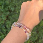 model wearing Rainbow Fluorite Clarity Bracelet front view