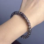 model wearing Smoky Quartz Faceted Bracelet front view