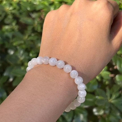 model wearing White Moonstone Bracelet under natural light