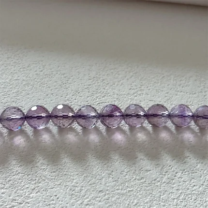 Faceted round amethyst